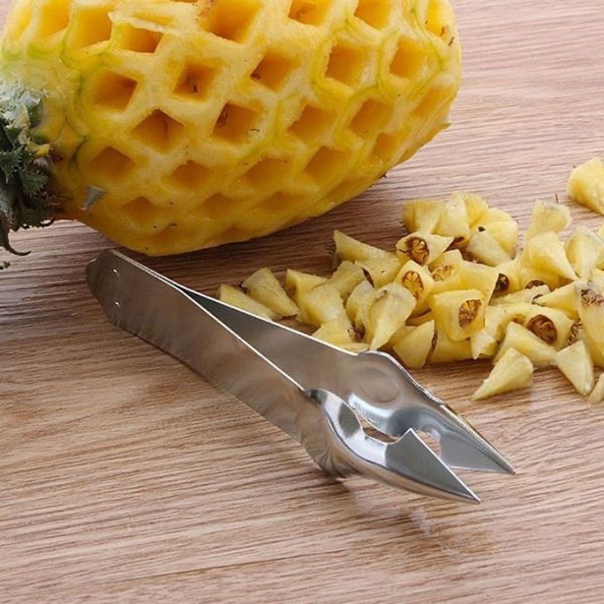 Dụng cụ gắp mắt dứa